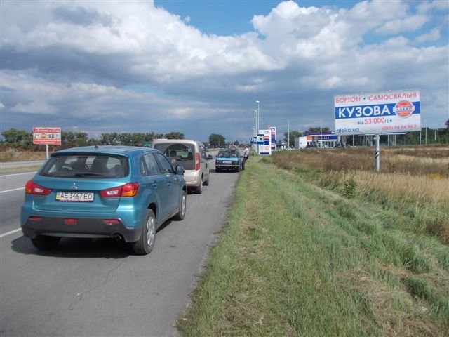 Билборд/Щит, Трассы, трасса М-04, Донецкое шосе, перед АЗС "Укртатнафта", р-н "Эпицентра", 221+850, выезд из города