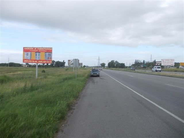 Билборд/Щит, Трассы, трасса М-04, Донецкое шосе, перед АЗС "Укртатнафта", р-н "Эпицентра", 221+850, въезд в город