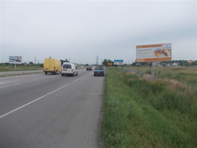 Билборд/Щит, Трассы, трасса М-04, Донецкое шосе, перед АЗС "Укртатнафта", р-н "Эпицентра", 221+900, въезд в город, справа